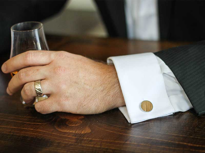 cufflinks made from a whiskey barrel