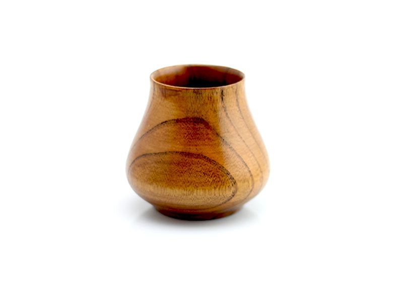 sipdark wood whiskey cup on white